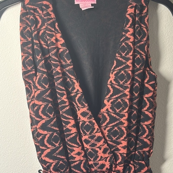 She’s Cool crossed top sleeveless orange black print semi sheer jumpsuit Sz L - Picture 2 of 5